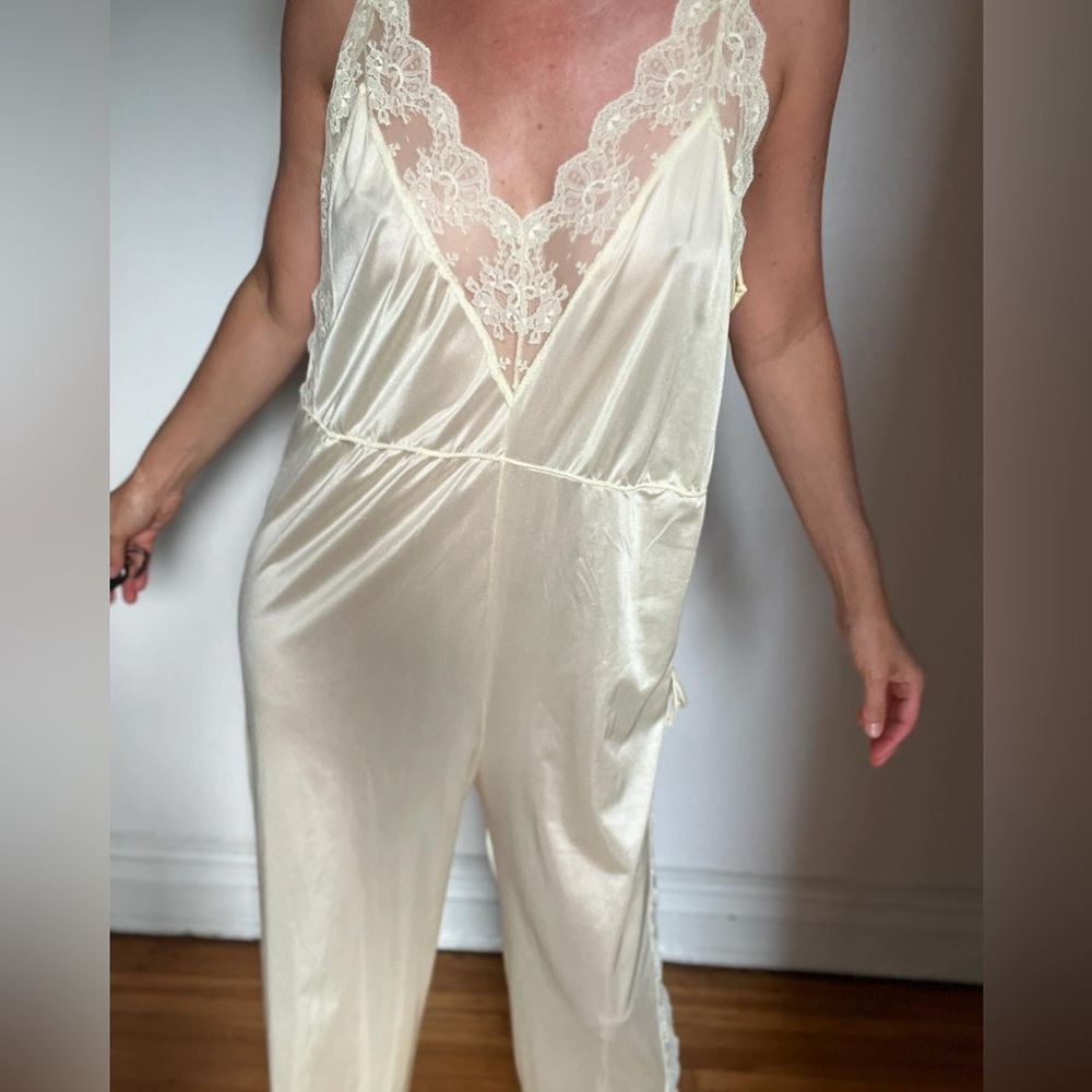 Lingerie jumpsuit made of nylon and lace with cute ties on the side. Open size. - Picture 13 of 14
